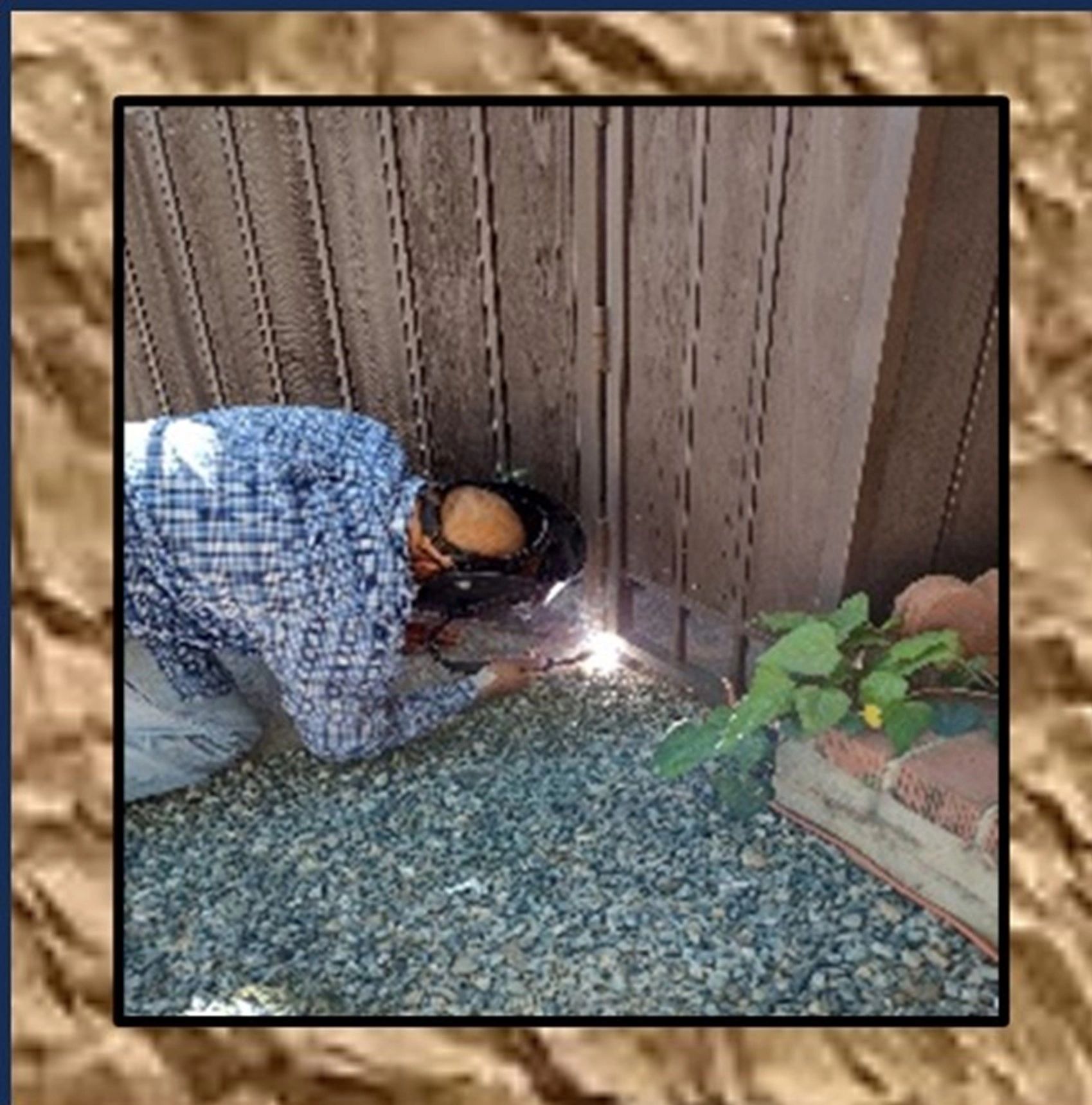 Construction worker at fence