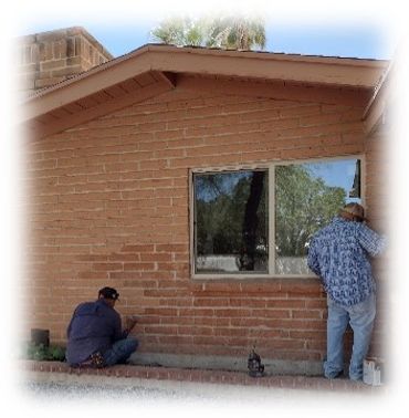 Workers installing window