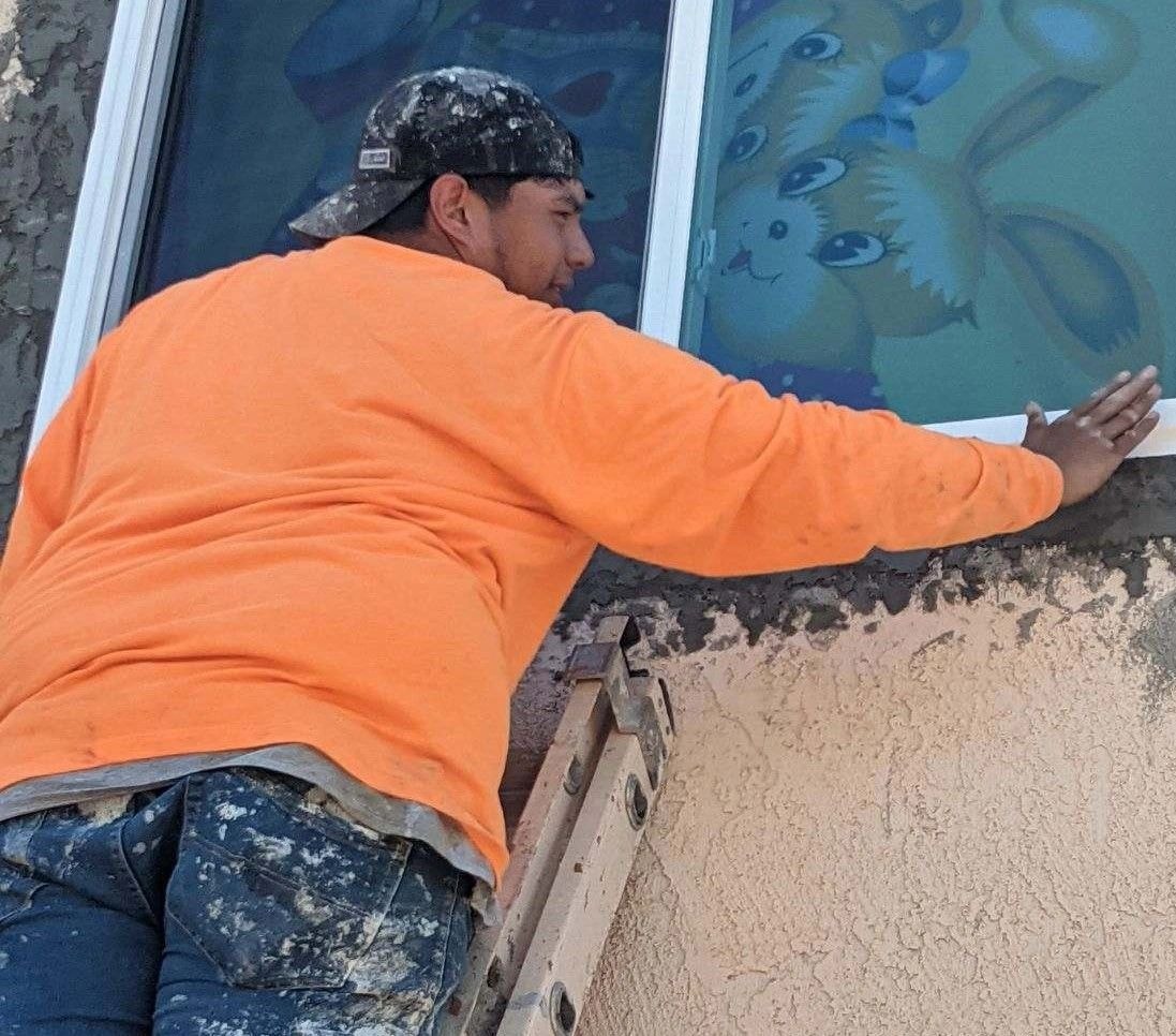 Stucco trade worker